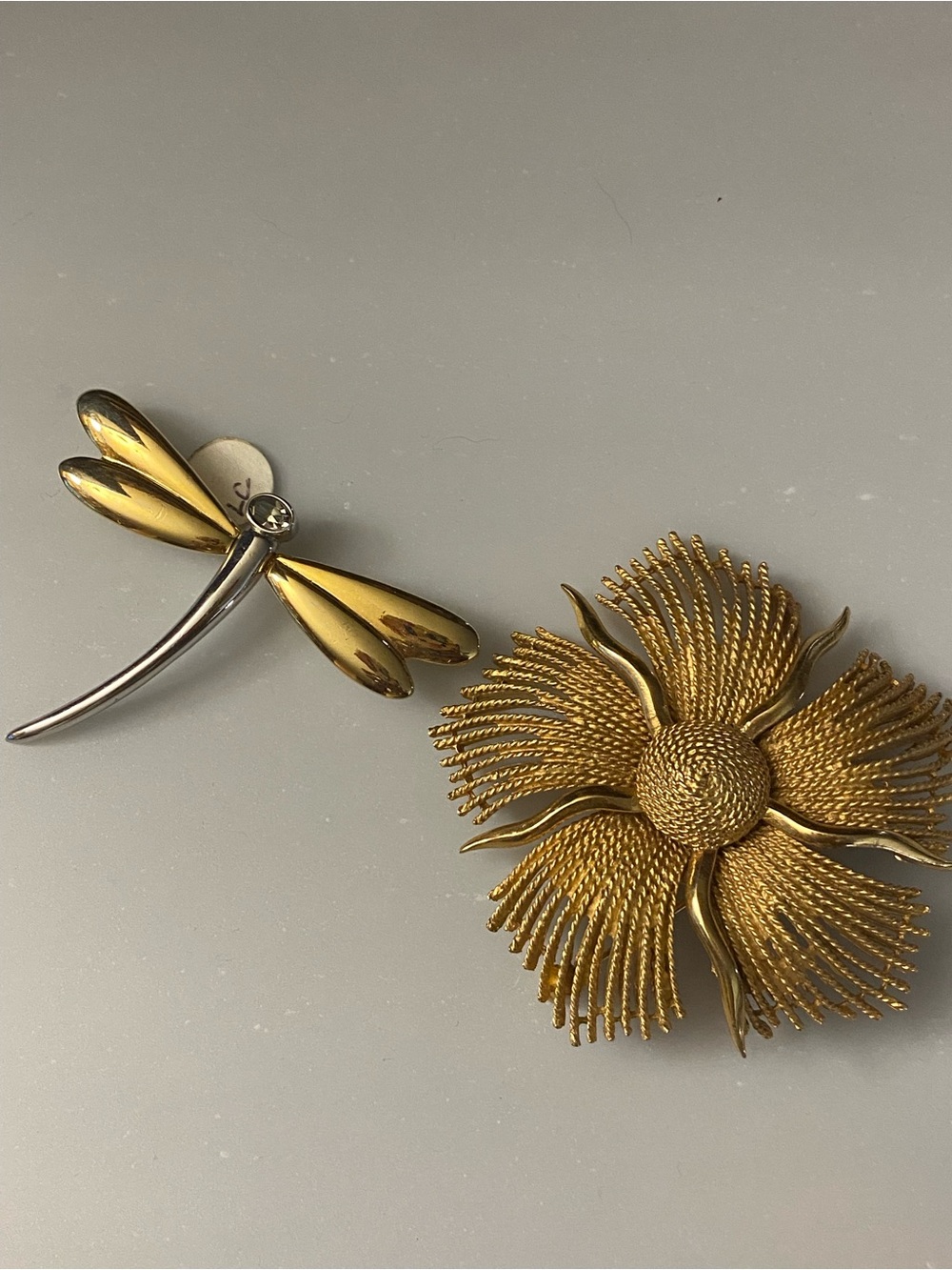 Dragon Fly Brooch (stamped LC) and Starburst Gild Tone Brooch.